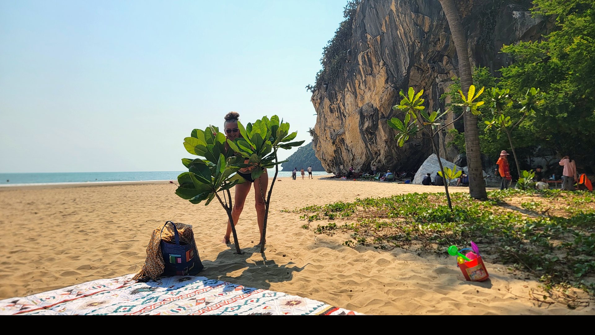 A beach day from Dave and Kim’s Thailand travels, beside limestone cliffs